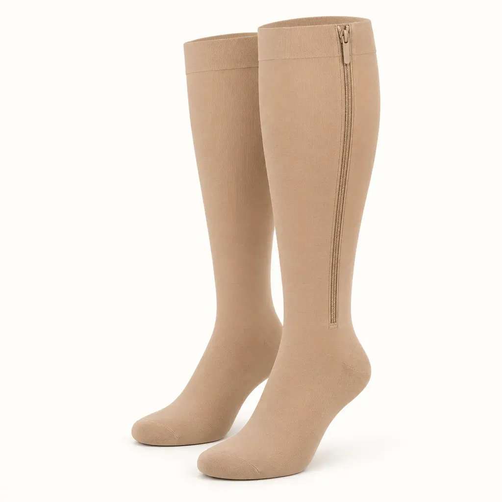 Beige firm zipper compression socks, side zipper visible from cuff to ankle